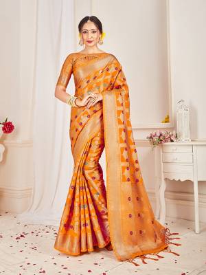Shine Bright Wearing This Pretty Designer Orange Colored Heavy Weaved Saree. This Saree And Blouse Are Fabricated On Banarasi Art Silk Beautified With Weave All Over. It Is Suitable For Upcoming Wedding And Festive Season. Buy Now.