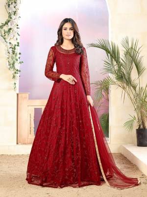 Grab This Very Beautiful Heavy Designer Floor Length Suit In Red Color. Its Top Is Fabricated On Net Paired With Santoon Bottom and Net Fabricated Dupatta. It Is Beautified With Tone To Tone Embroidery All Over. Buy Now.