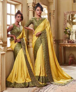 You Will Definitely Earn Lots Of Compliments Wearing This Pretty Saree In Yellow Color Paired With Green Colored Blouse. This Saree Is Fabricated On Soft Art Silk Which Also Gives A Rich Look To Your Personality.