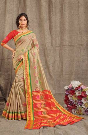 Look Beautiful Wearing This Rich Designer Saree In Beige Color Paired With Contrasting Red Colored Blouse. This Saree And Blouse Are Fabricated On Cotton Handloom Beautified With Weave. Buy Now.