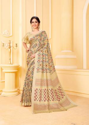 Get Ready For The Upcoming Winters With This Lovely Saree In Cream Color. This Saree And Blouse Are Fabricated On Pashmina Beautified With Prints All Over. Its Rich Fabric and Color Will Earn You Lots Of Compliments From Onlookers. 