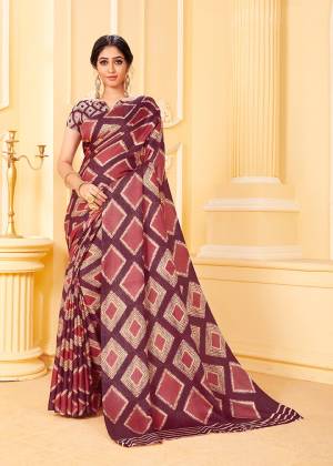 Add This Pretty Designer Saree To Your Wardrobe In Wine Color Beautified With Prints All Over. This Saree And Blouse Are Fabricated Pashmina Which Is Suitable For the Upcoming Winters. Buy Now.