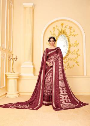 Add This Pretty Designer Saree To Your Wardrobe In Maroon Color Beautified With Prints All Over. This Saree And Blouse Are Fabricated Pashmina Which Is Suitable For the Upcoming Winters. Buy Now.
