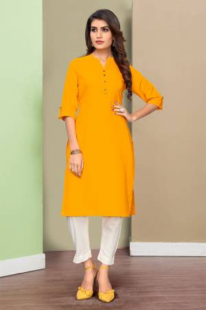 Simple and Elegant Looking Readymade Straight Kurti Is Here In Musturd Yellow Color Fabricated On Rayon. This Plain Kurti Can Be Paired With Same Or contrasting Colored Bottom. 