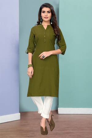 Simple and Elegant Looking Readymade Straight Kurti Is Here In Olive Green Color Fabricated On Rayon. This Plain Kurti Can Be Paired With Same Or contrasting Colored Bottom. 