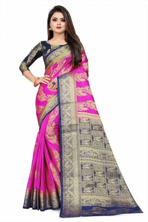 Grab This Beautiful Designer Weaved Saree In Rani Pink color Paired With Royal Blue Colored Blouse. This Saree And Blouse Are Fabricated On Art Silk Which Also Gives A Rich Look To Your Personality. 