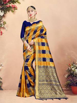 Here Is Rich Silk Based Designer Saree In Musturd Yellow And Navy Blue Color Paired With Navy Blue Colored Blouse. This Saree And Blouse Are Fabricated On Banarasi Art Silk Beautified With Weave And Checks Pattern All Over. 