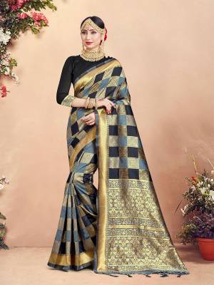 Here Is Rich Silk Based Designer Saree In Grey And Black Color Paired With Black Colored Blouse. This Saree And Blouse Are Fabricated On Banarasi Art Silk Beautified With Weave And Checks Pattern All Over. 