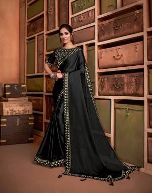 Symbolic of bold, beautiful and glamour - this black saree with subtle gold embellishments is a perfect pick for your evening or night soiree. Add on to the glamourous outlook by pairing the saree with dainty yet statement making jewels. 