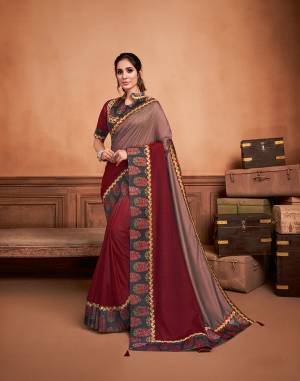 Bring out your love for deep reds exuding mysterious appeal in this shaded silk saree enriched with block print inspired printed border and look gorgeous. 