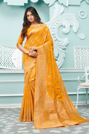 Celebrate This Festive Season Wearing This Pretty Saree In Musturd Yellow Color. This Saree And Blouse Are Fabricated On Cotton Handloom Beautified With Weave.