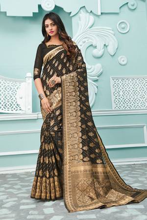 Simple And Elegant Looking Silk Based saree Is Here In Black Color. This Saree and Blouse Are Fabricated On Cotton Handloom Beautified With Weave All Over. Buy Now