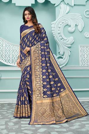 Celebrate This Festive Season Wearing This Pretty Saree In Navy Blue Color. This Saree And Blouse Are Fabricated On Cotton Handloom Beautified With Weave.