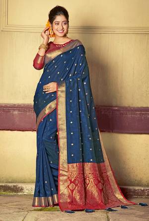 Simple And Elegant Looking Silk Based Saree Is Here In Navy Blue Color Paired With Maroon Colored Blouse. This saree And Blouse Are Fabricated On Handloom Silk Beautified With Weave. Buy Now.
