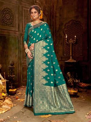 Flaunt Your Rich And Elegant Taste Wearing Thi Silk Based saree Is Here In Sea Green Color. This Saree and Blouse Are Fabricated On Banarasi Art Silk Beautified With Weave All Over. Buy Now.