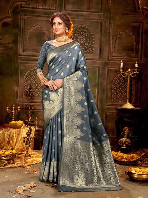 Flaunt Your Rich And Elegant Taste Wearing Thi Silk Based saree Is Here In Grey Color. This Saree and Blouse Are Fabricated On Banarasi Art Silk Beautified With Weave All Over. Buy Now.