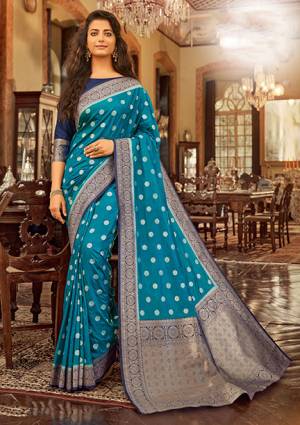 Flaunt Your Rich And Elegant Taste In This Blue Colored Saree Paired With Navy Blue Colored Blouse. This Saree And Blouse Are Fabricated On Chanderi Cotton Beautified With Weave. Buy This Saree Now.