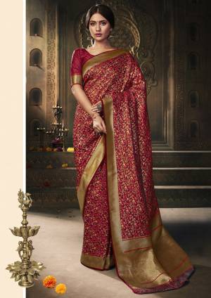 Here Is A Royal Looking Rich Designer Saree In Maroon Color. This Saree And Blouse Are Fabricated On Banarasi Art Silk Beautified With Detailed Weave. Its Rich Fabric And Color Gives An elegant Look And Will Definitely Earn You Lots Of Compliments From Onlookers. 