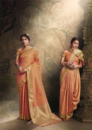 Here Is A Royal Looking Rich Designer Saree In Orange Color. This Saree And Blouse Are Fabricated On Banarasi Art Silk Beautified With Detailed Weave. Its Rich Fabric And Color Gives An elegant Look And Will Definitely Earn You Lots Of Compliments From Onlookers. 