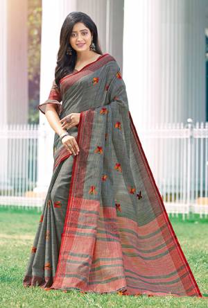 Flaunt Yout Rich And Elegant Taste Wearing This Saree In Grey Color. This Elegant Looking Saree And Blouse Are Fabricated On Line Beautified With Minimal Thread Embroidered Motifs. 