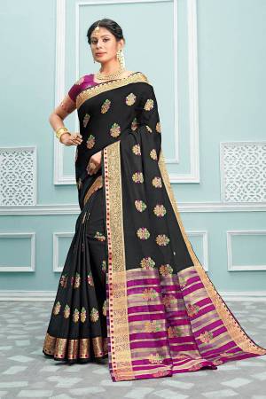 Celebrate This Festive Season Wearing This Designer Saree In Black Color Paired With Contrasting Magenta Pink Colored Blouse. This Saree and Blouse Are Fabricated On Cotton Beautified With Weave. Buy This Pretty Saree Now.