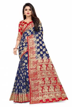 For A Proper Traditional Look, Grab This Heavy Weaved Silk Based Designer Saree In Navy Blue Color Paired with Red Colored blouse. This Saree and Blouse Are Fabricated On Art Silk Which Gives A Rich Look To Your Personality. 