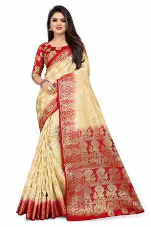 For A Proper Traditional Look, Grab This Heavy Weaved Silk Based Designer Saree In Cream Color Paired with Red Colored blouse. This Saree and Blouse Are Fabricated On Art Silk Which Gives A Rich Look To Your Personality. 