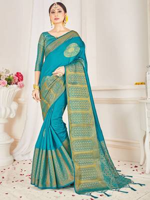 Flaunt Your Rich and Elegant Taste Wearing This Designer Silk Based Saree In Blue Color Paired With Blue Colored Blouse. This Saree And Blouse Are Fabricated On Banarasi Art Silk Beautified With Weaved Broad Border. 