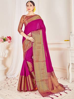 Flaunt Your Rich and Elegant Taste Wearing This Designer Silk Based Saree In Magenta Pink Color Paired With Golden Colored Blouse. This Saree And Blouse Are Fabricated On Banarasi Art Silk Beautified With Weaved Broad Border. 