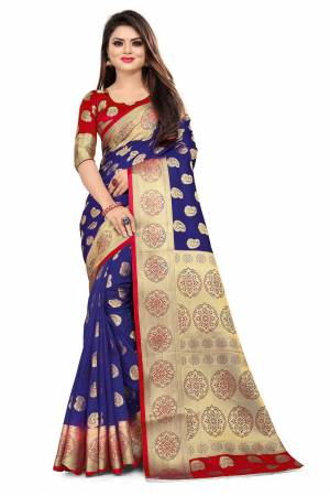 For A Proper Traditional Look, Grab This Heavy Weaved Silk Based Designer Saree In Navy Blue Color Paired with Red Colored blouse. This Saree and Blouse Are Fabricated On Art Silk Which Gives A Rich Look To Your Personality. 