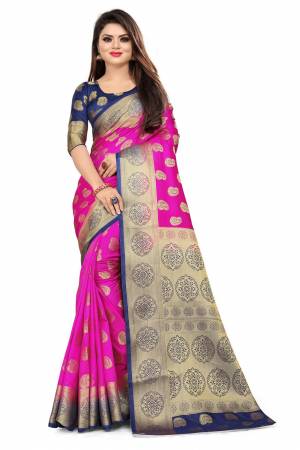 For A Proper Traditional Look, Grab This Heavy Weaved Silk Based Designer Saree In Rani Pink Color Paired with Navy Blue Colored blouse. This Saree and Blouse Are Fabricated On Art Silk Which Gives A Rich Look To Your Personality. 