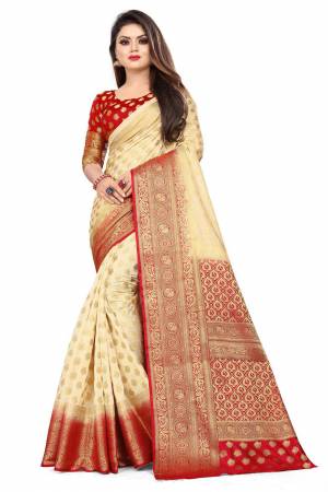 For A Proper Traditional Look, Grab This Heavy Weaved Silk Based Designer Saree In Cream Color Paired with Red Colored blouse. This Saree and Blouse Are Fabricated On Art Silk Which Gives A Rich Look To Your Personality. 
