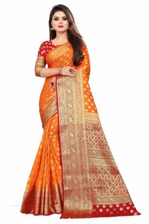 For A Proper Traditional Look, Grab This Heavy Weaved Silk Based Designer Saree In Orange Color Paired with Red Colored blouse. This Saree and Blouse Are Fabricated On Art Silk Which Gives A Rich Look To Your Personality. 