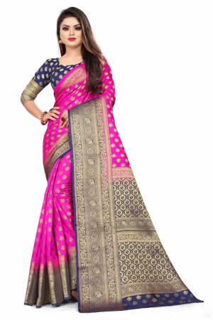 For A Proper Traditional Look, Grab This Heavy Weaved Silk Based Designer Saree In Rani Pink Color Paired with Navy Blue Colored blouse. This Saree and Blouse Are Fabricated On Art Silk Which Gives A Rich Look To Your Personality. 
