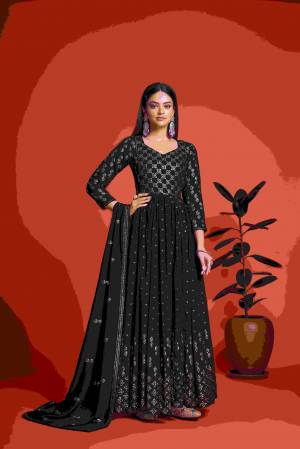 Look Pretty Wearing This Lovely Designer Gown With Dupatta Here