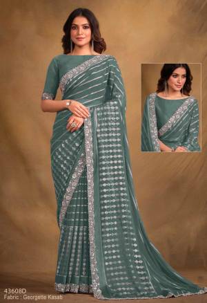 Look Pretty Wearing This Lovely Designer  Saree